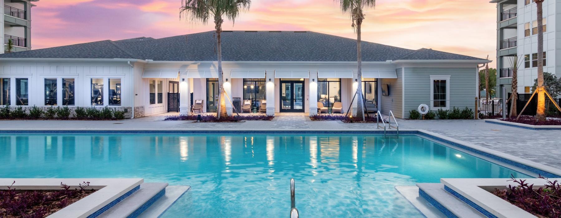 a pool in front of a building